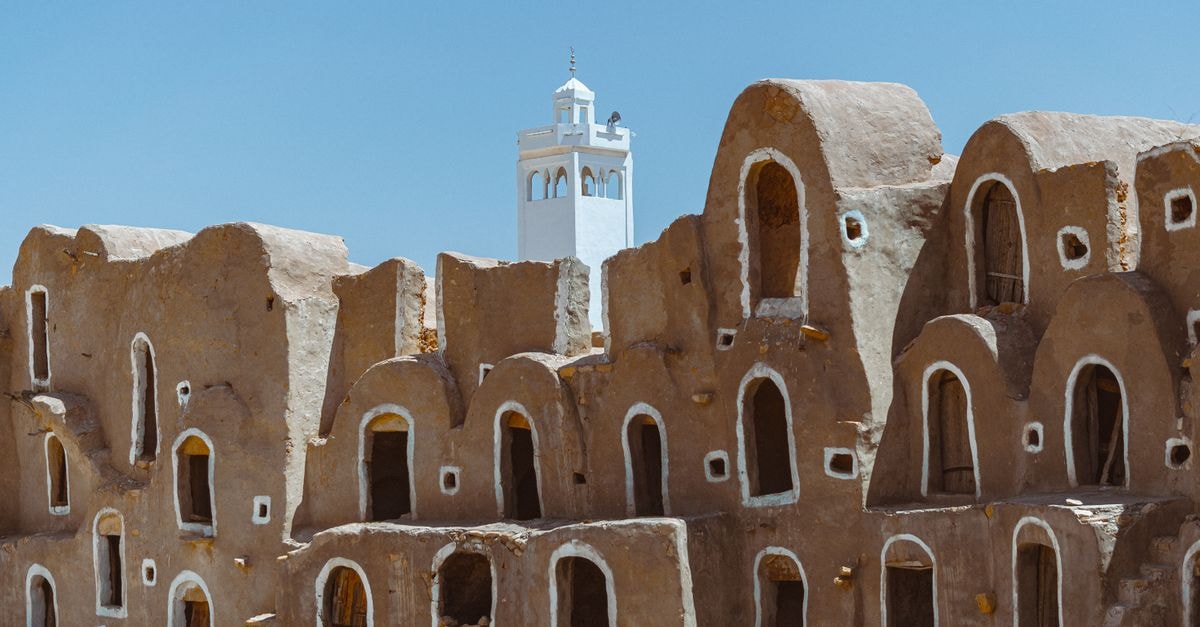 Discover ancient Ksour architecture in the sunlit landscapes of Tataouine, Tunisia.