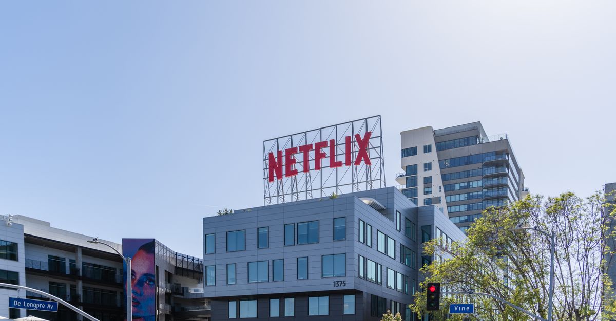 Warner Bros. Discovery Sues Amazon Over Executive Poaching Exterior view of Netflix headquarters in Los Angeles under a clear sky.