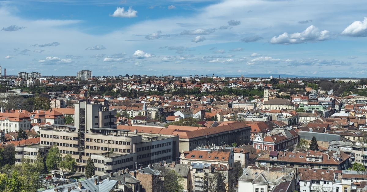 A panoramic aerial view of the old town in Belgrade, Serbia. Captures the city's architectural charm under a clear blue sky.