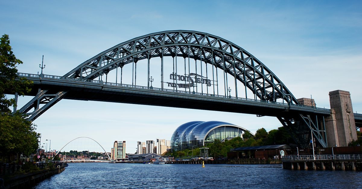 Iconic view of the Tyne Bridge and Sage Gateshead over the River Tyne in Newcastle.