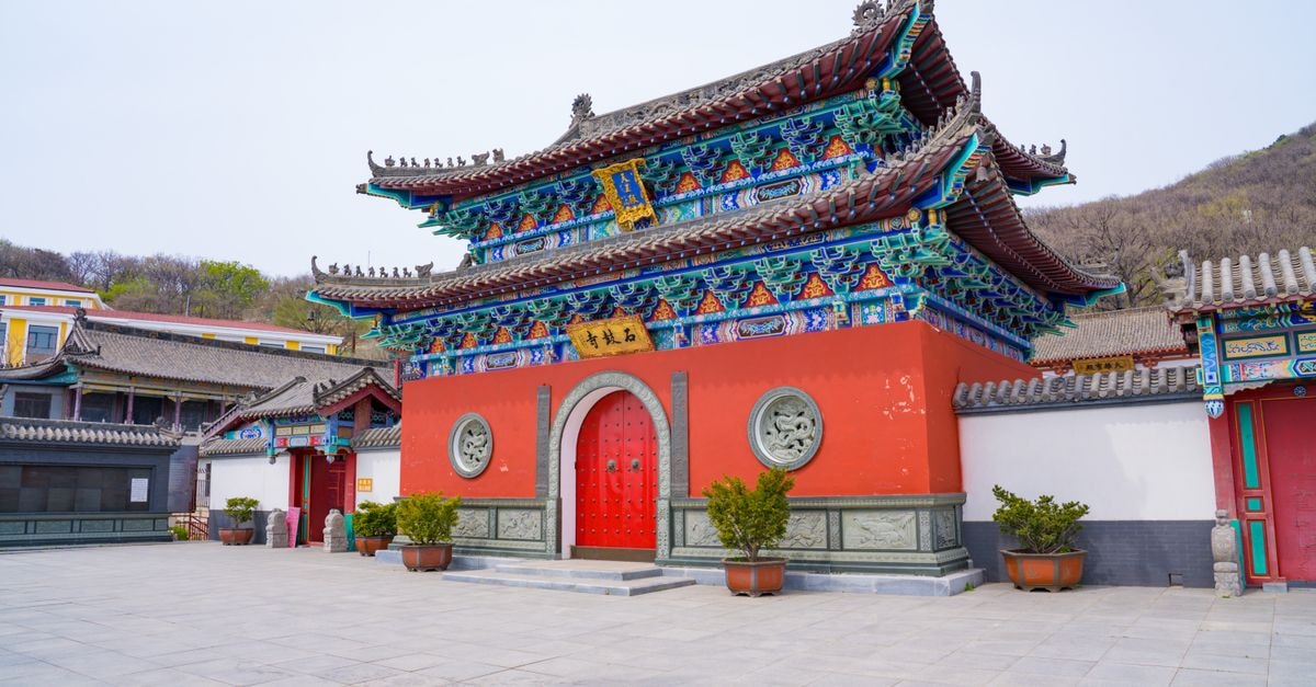 Shaoyang Travel Guide: Planning Tips, Costs and Things to Do Beautiful traditional Chinese temple architecture in Dalian, Liaoning Province, China during spring.