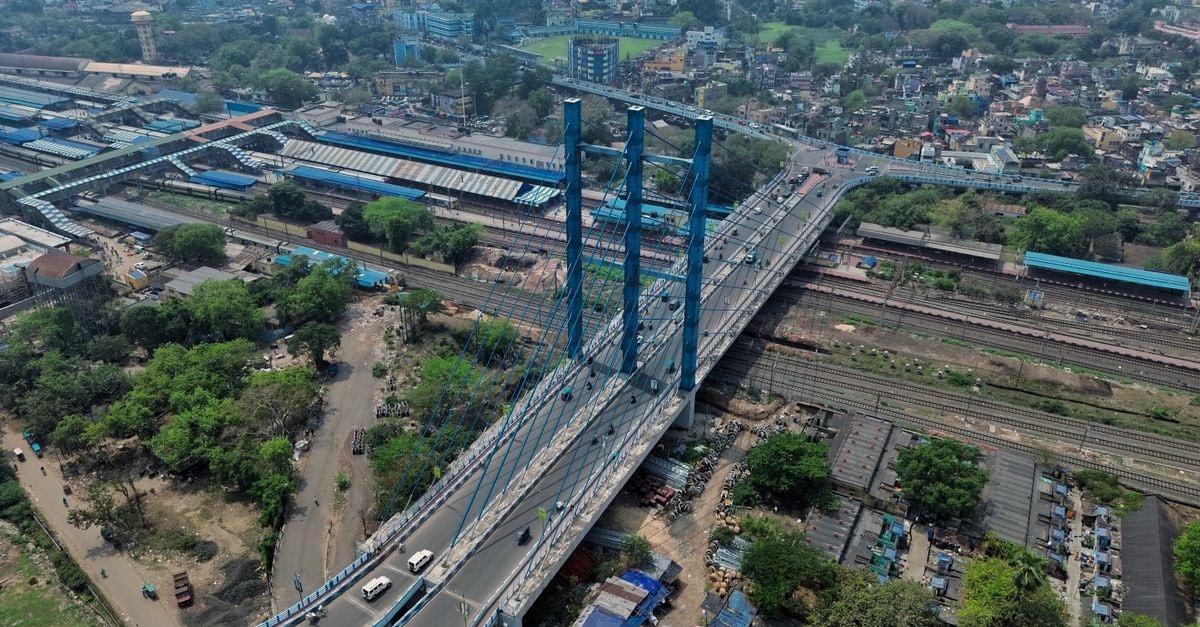 DSMS Hostel, Durgapur — A Campus-Style Stay on DPS Road Aerial view capturing the vibrant landscape of Bardhaman, India, featuring a prominent bridge and railway tracks.