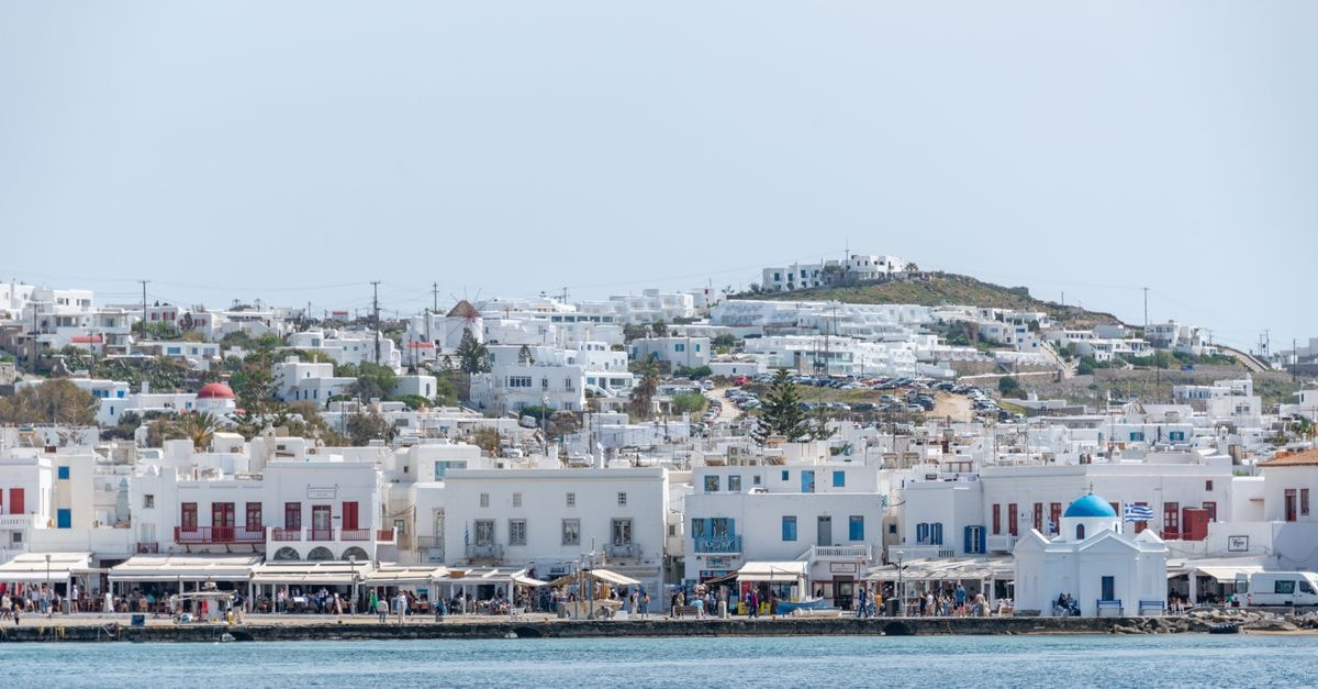 Eleanna's Mykonos in Mykonos Town: Cycladic Charm Steps from the Aegean Scenic view of the iconic waterfront and architecture in Mykonos, Greece.