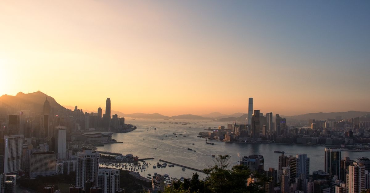 Le Sans Souci Guest House, Victoria — Serenity on Mahé A breathtaking view of Hong Kong's skyline and harbor at sunset, capturing urban beauty.