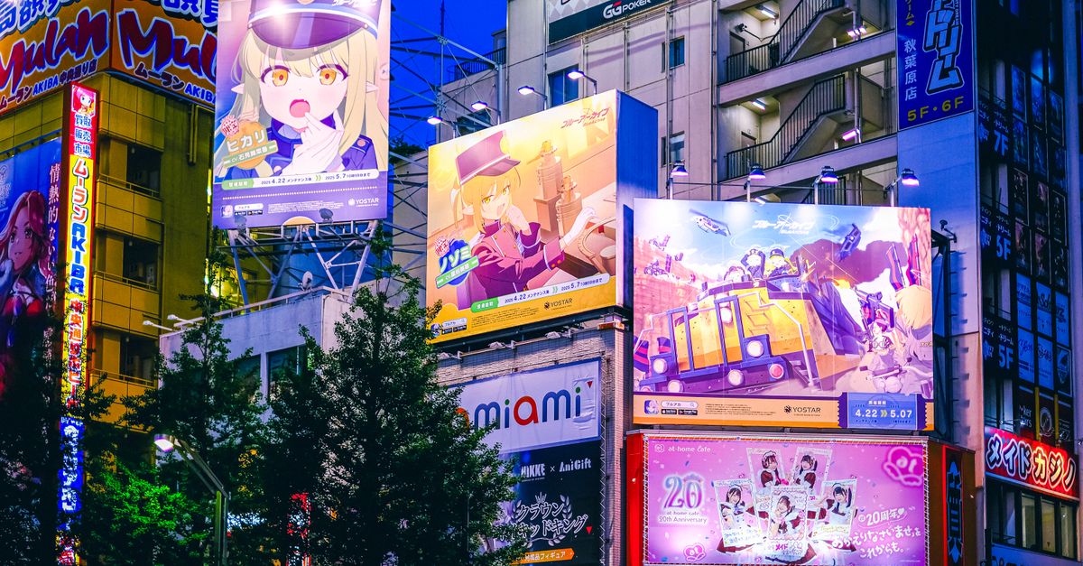 ORICON weekly chart topped by One Piece Vol. 115 as Manga Mavericks announces indie alliance Bright anime billboards illuminate the night in Akihabara, Tokyo, showcasing the vibrant nightlife.