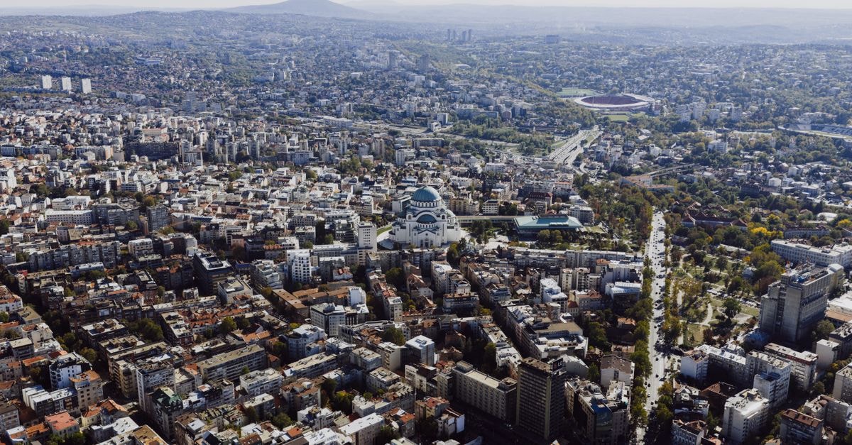 Aerial shot of Belgrade cityscape featuring the iconic St. Sava Temple, Serbia.