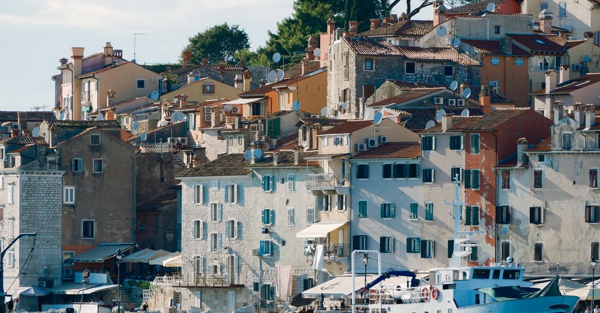 Picturesque view of historic Mediterranean architecture by the sea in Rovinj, Croatia.