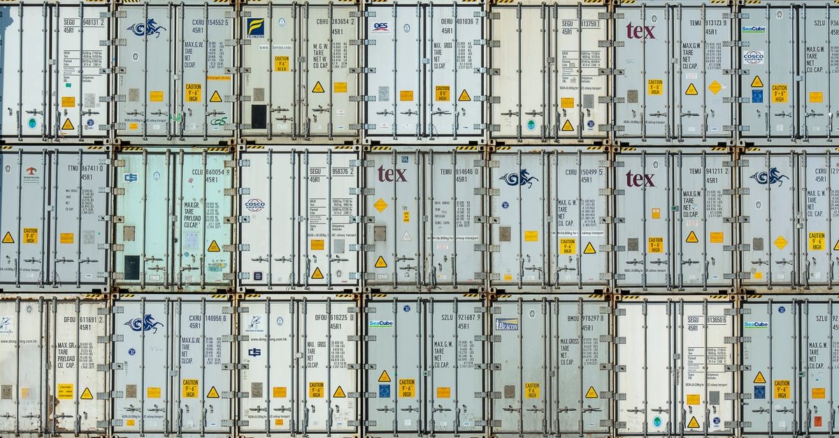 Pattern Group: A Scale Marketplace Accelerator Trading Well Ahead of Its Cash A patterned array of industrial shipping containers stacked in a storage terminal.