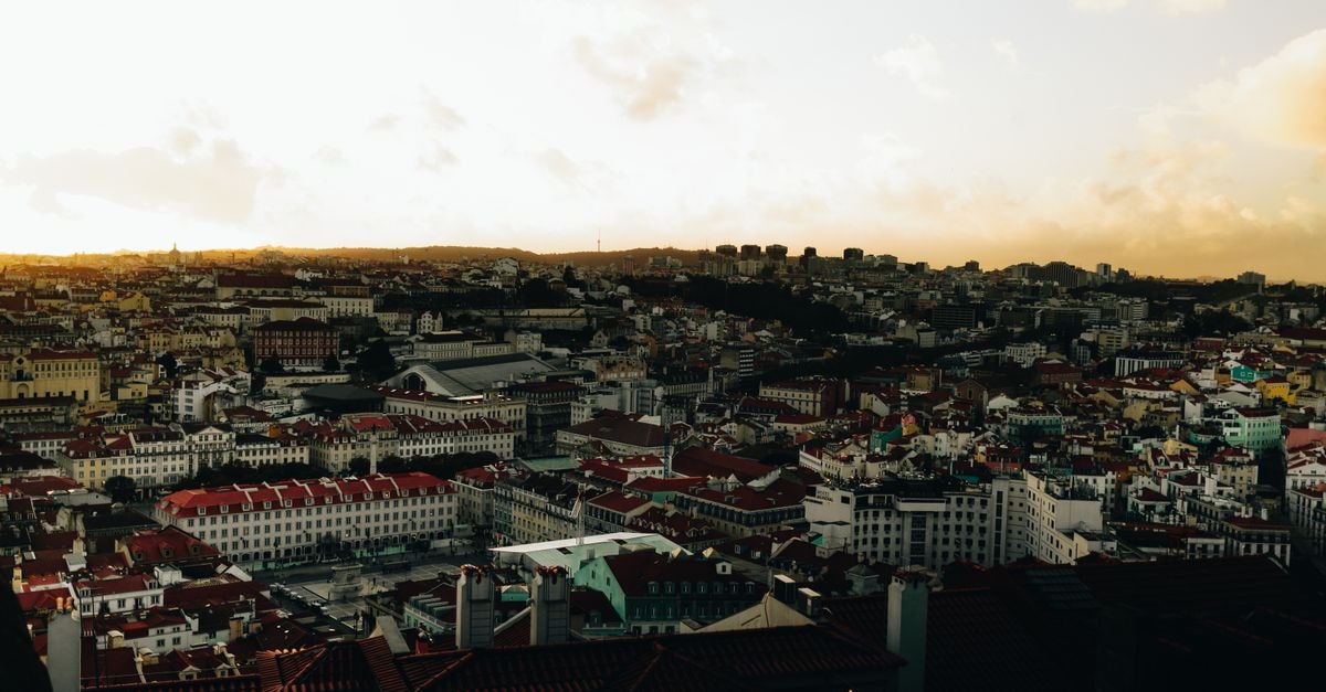 Yes! Lisbon Hostel, Lisbon: A Vibrant Downtown Stay on Rua de São Julião A breathtaking aerial view of Lisbon's cityscape at sunset, showcasing its iconic architecture.
