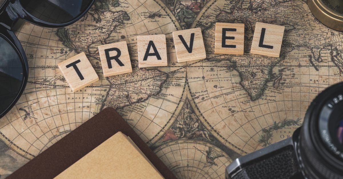 Aba travel guide: planning the practical essentials Vintage map with travel essentials like camera and sunglasses arranged in a flat lay, perfect for adventure themes.