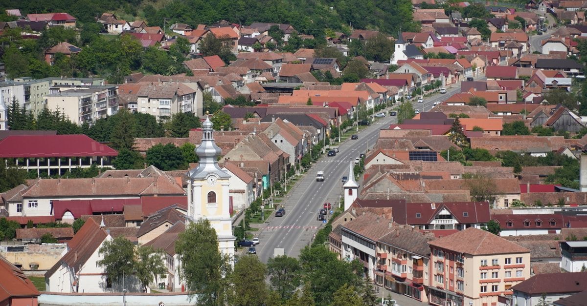 Pensiunea Alexia in Piatra Neamț: A Quiet Guesthouse Near the Road to Bicaz Aerial view of Rupea town in Transylvania, Romania, showcasing traditional architecture and scenic landscapes.