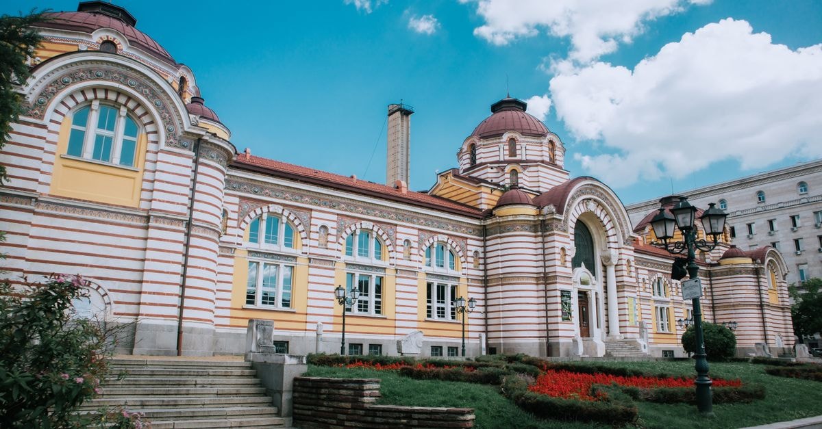 Floresti Travel Guide: Planning Tips, Costs and Things to Do Sofia Central Mineral Baths in its colorful architectural glory under a clear sky.