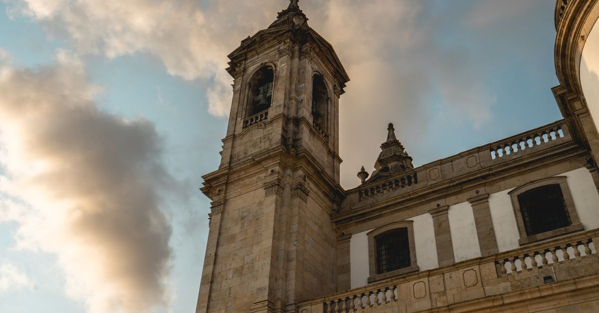 Braga Travel Guide: Churches, Stairways and a Slower Portuguese Pace Capture of the impressive Sanctuary of Our Lady of Sameiro architecture against a moody sky in Braga, Portugal.