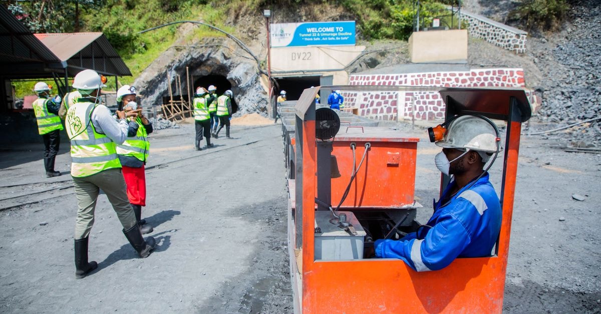 Silver extends multi-month rally into mid-August as sterling and dollar quotes both gain Workers at an outdoor mining site with a focus on rail transport safety.