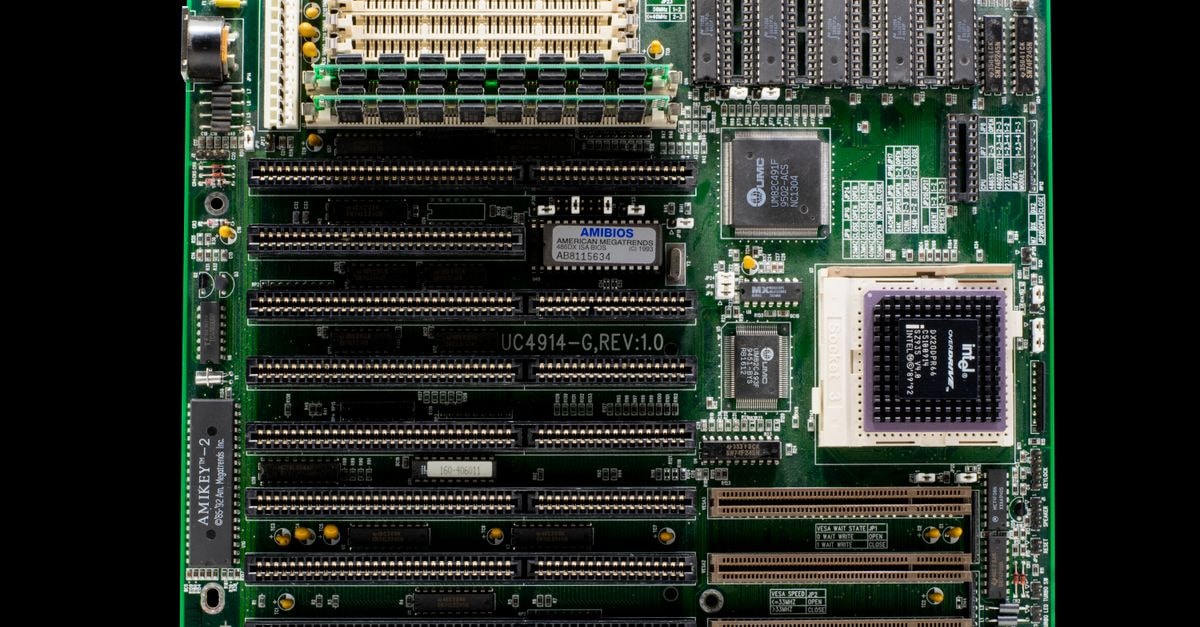Samsung Expands Memory Supply Deals and HBM4 Push as Consumer Electronics Slip to a Loss A close-up of a vintage motherboard highlighting microchips and electronic components.