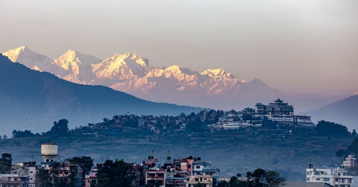 Kathmandu Guest House, Kathmandu — Thamel's Iconic 1968 Landmark Stunning sunset view of Kathmandu Valley with the Himalayas in the background in Nepal.