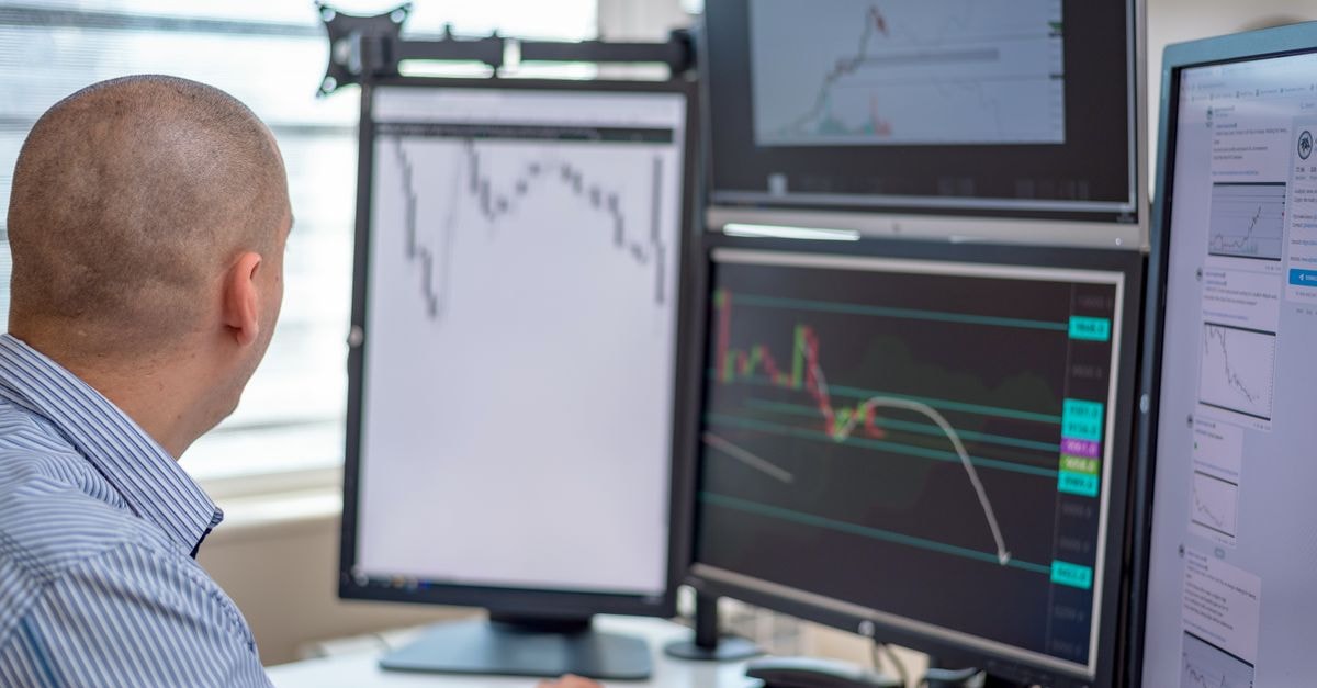 Several small-cap advisors open new positions in Prologis as stock trades near $141 Trader analyzing financial data on multiple monitors in an office setting.