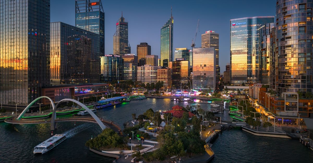 DoubleTree by Hilton Perth Northbridge: A New-Build Milestone in Western Australia Explore the dynamic skyline of Perth reflecting city life at sunset over the Swan River.
