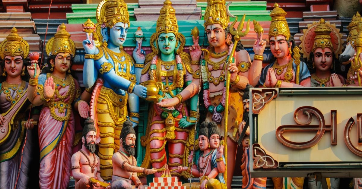 Avadi Travel Guide: Quiet Corners and Easy Days Near Chennai Detailed Hindu god sculptures adorn a temple in Chennai, showcasing rich cultural and religious artistry.