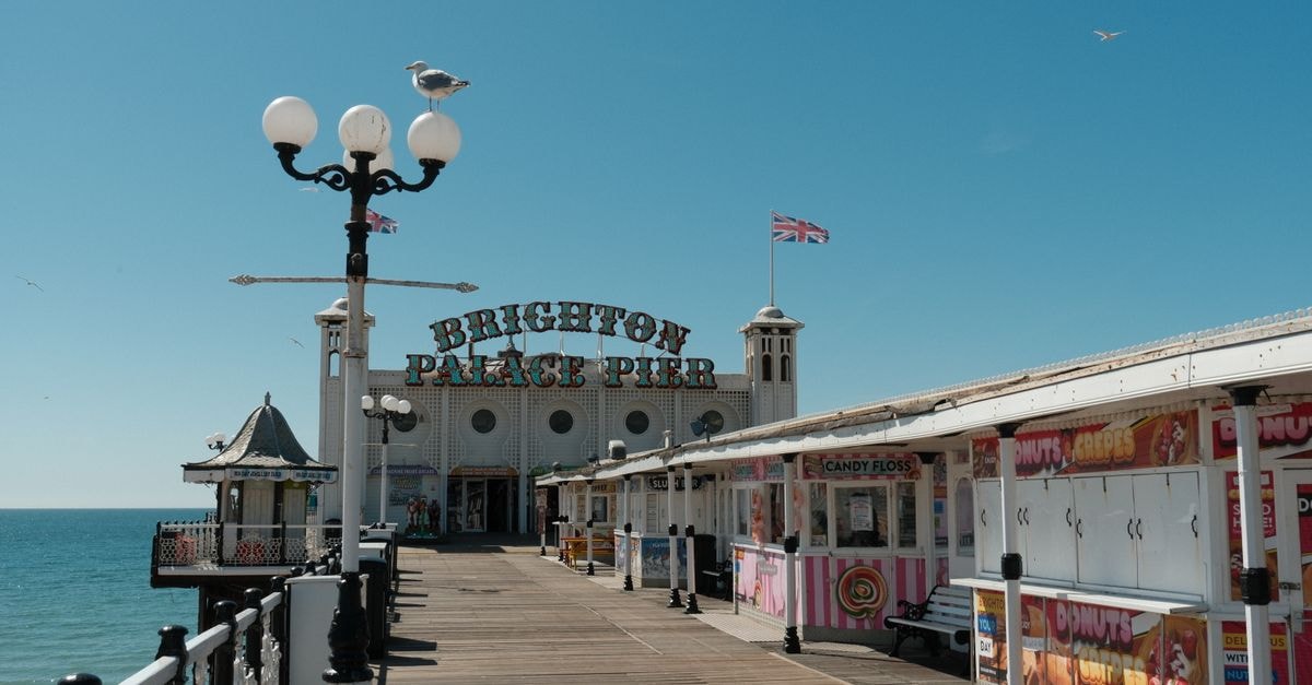 Southend-on-Sea Travel Guide: Getting Around and Eating Well Explore Brighton Palace Pier's charming seaside atmosphere on a sunny day.