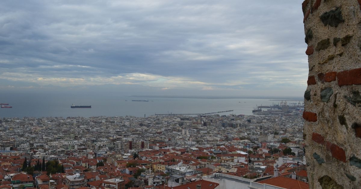 Holiday Inn Thessaloniki: Rooftop Pool Near the Old City Aerial view of Thessaloniki, Greece from the historic Byzantine walls overlooking the port and cityscape.