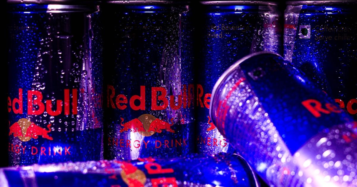 Red Bull Adds FDJ United-SUEZ as Major Partner; Romaniacs Hard Enduro and Mostar Cliff Diving Reach Final Stages Close-up of Red Bull cans with water droplets, showcasing a refreshing and energetic vibe.