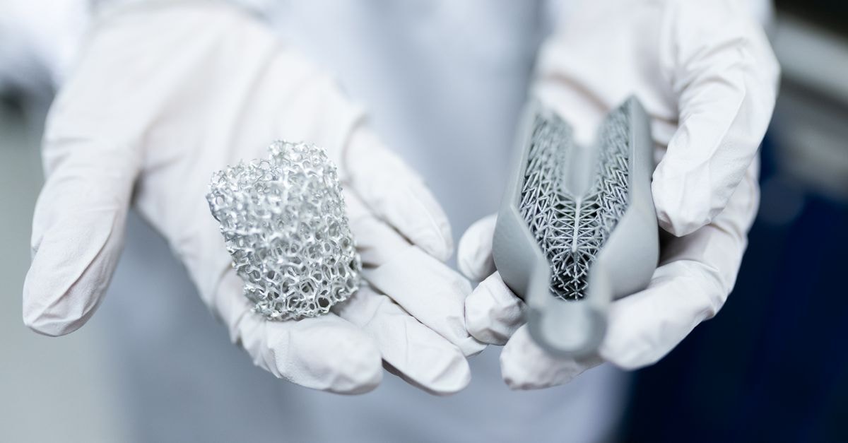 Israeli Surgeons Implant 3D-Printed Chest Cage; Gefertec Launches Arctitan Titanium WAAM System Laboratory setting showing gloved hands holding innovative 3D printed metal structures.