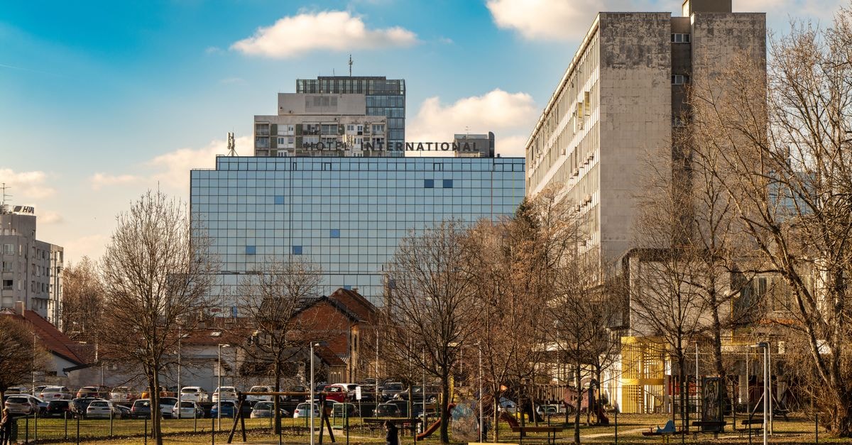Hostel Centar in Zagreb: A Quiet 19-Bed Stay Steps from the Main Square Scenic urban landscape featuring Hotel International in Zagreb on a sunny day.