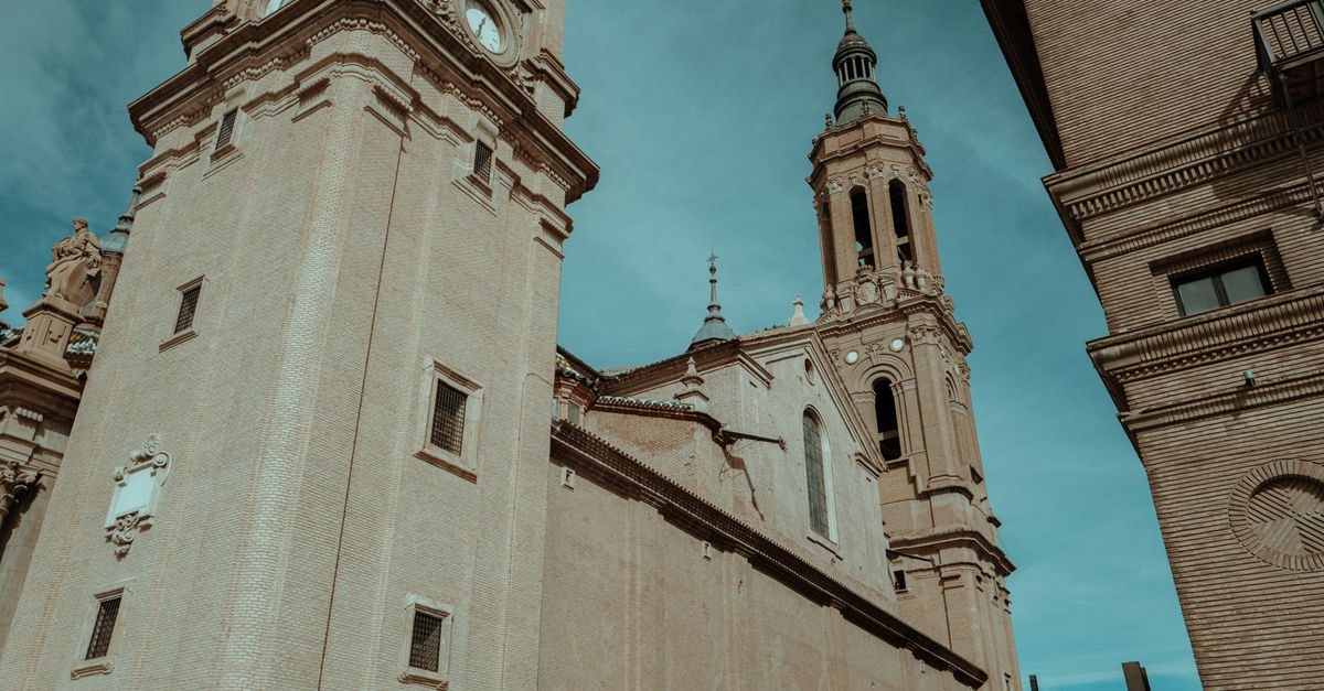Zaragoza Travel Guide: Quiet Rhythms and Big Flavors Historic architectural details captured at the Basilica of Our Lady of the Pillar on a clear day.