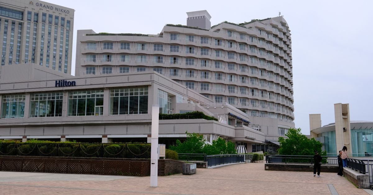 Grand Hotel in Elbasan: Family Rooms and a City-View Bar View of the Hilton Tokyo Odaiba and Grand Nikko hotels, showcasing modern urban architecture in Tokyo, Japan.