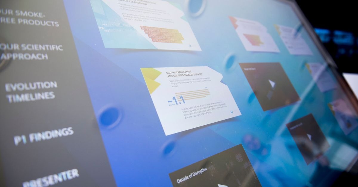 Close-up of a digital touchscreen displaying various data and graphics.