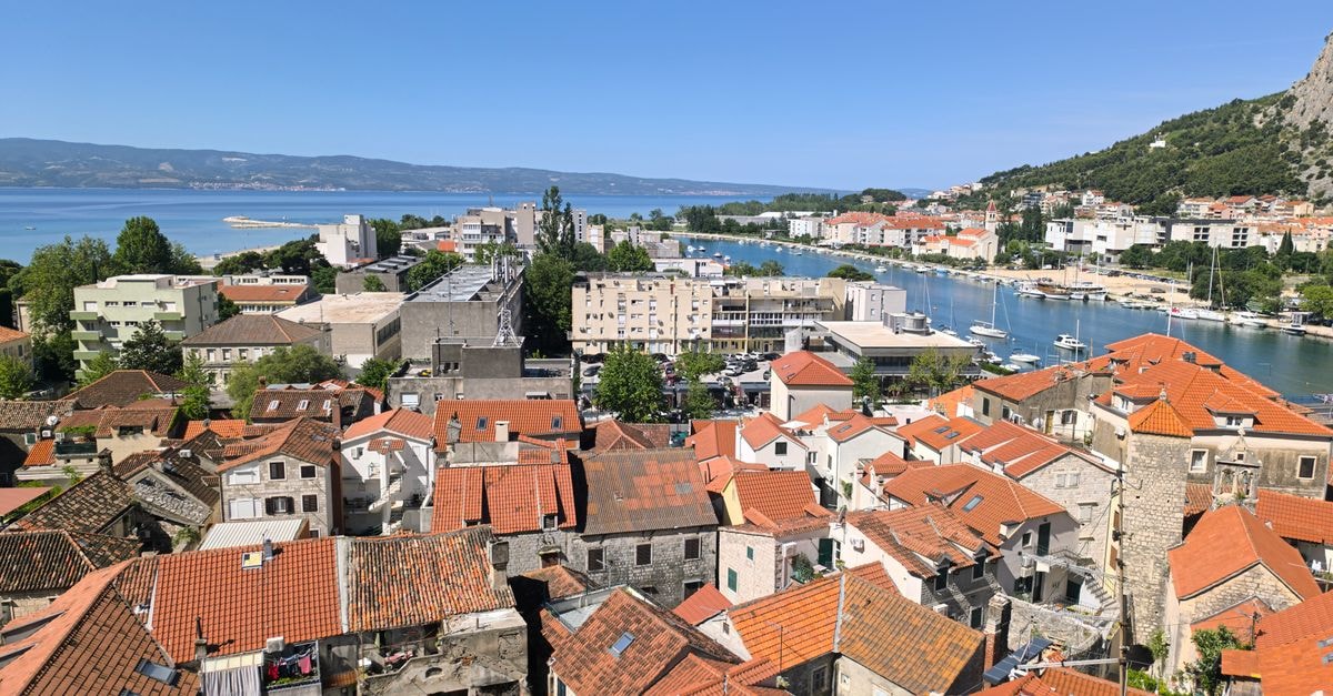 Hotel Pljevlja in Pljevlja: A Central Stay at the Crossroads of East and West Aerial view of Omiš, Croatia showcasing traditional architecture and the stunning Adriatic Sea in summer.