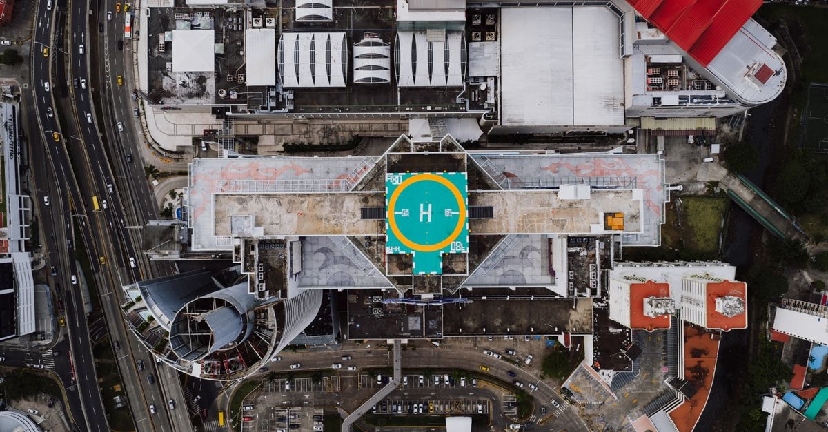 Hotel Merced Plaza in Cúcuta: A Quiet Stay in Barrio La Merced Aerial shot of urban architecture in Panama City with a prominent helipad.
