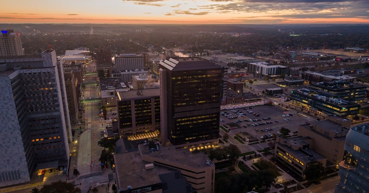 BUCHANAN Hotel, Buchanan: Coastal Liberia’s Welcoming Stay Aerial shot of Rochester, Minnesota skyline during twilight with city lights and sunset colors.