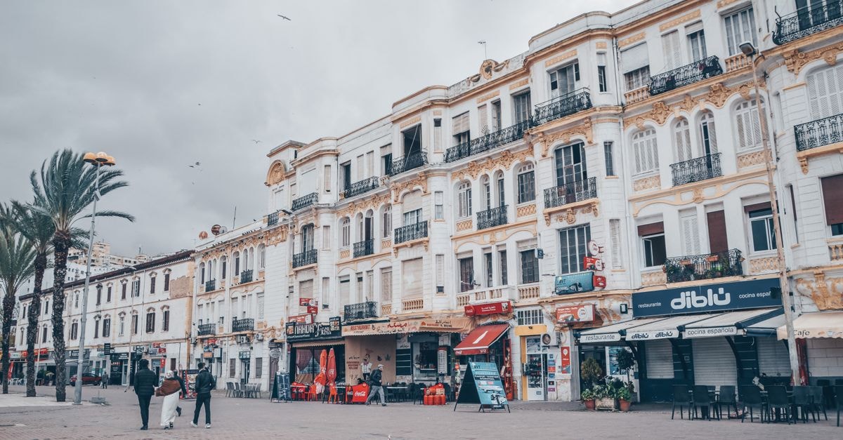 Hilton Garden Inn Tanger City Center, Tangier — A Northern Coast Stay Elegant colonial buildings line a bustling city square in Tangier, Morocco.