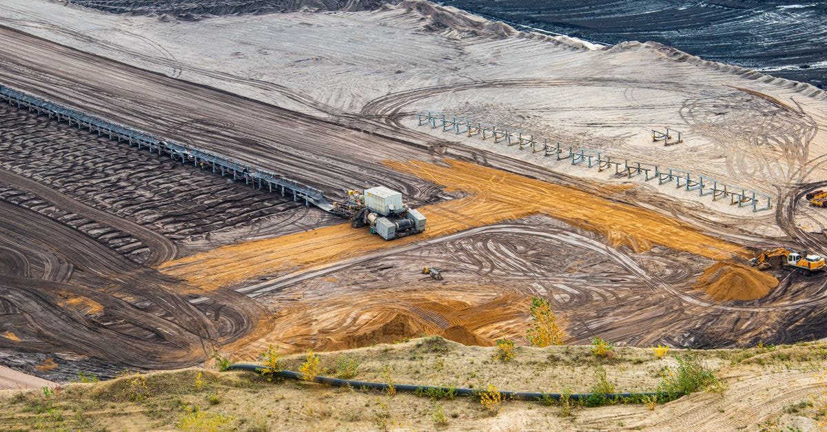 LibertyStream Reports Three Months of Battery-Grade Lithium Carbonate Production at Freedom Launchpad Expansive view of mining equipment and terrain in Jüchen, Germany.