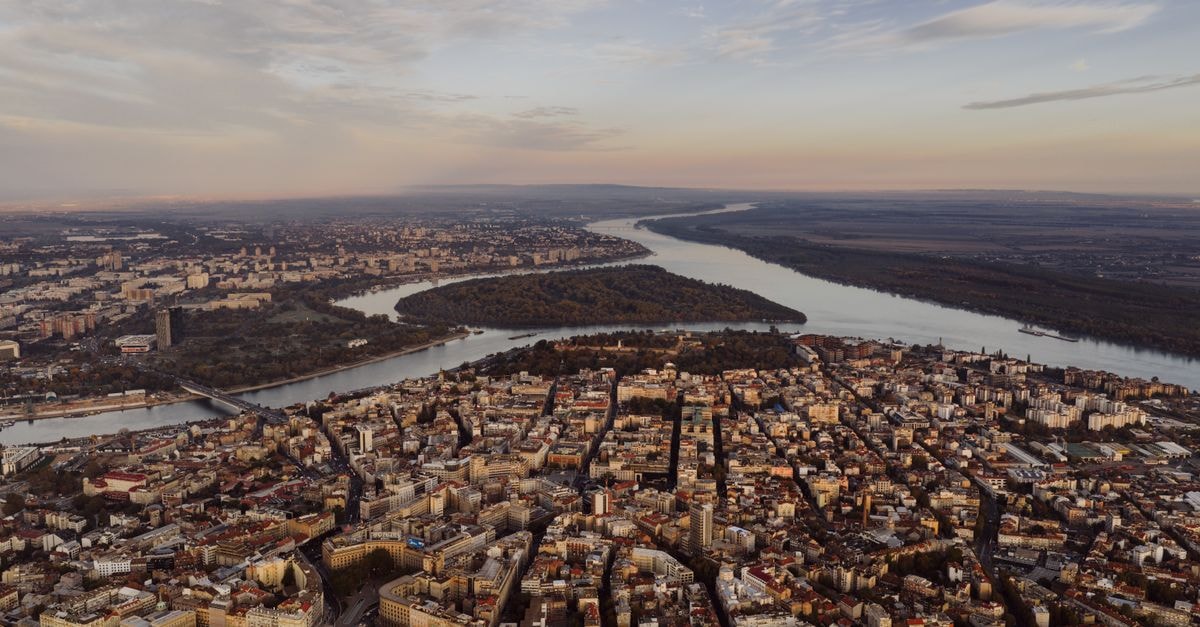 A Slow-Travel Guide to Niš, Serbia's Understated City Breathtaking aerial view of Belgrade, Serbia with the Danube River winding through the city.