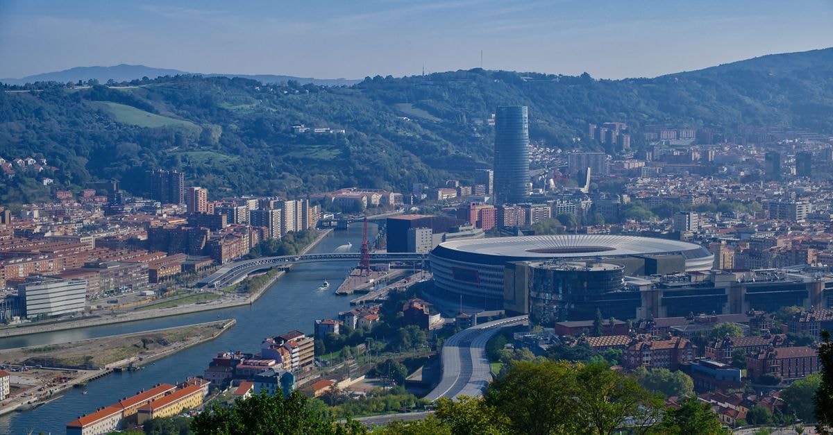 Breathtaking view of Bilbao cityscape featuring San Mames Stadium and Iberdrola Tower.