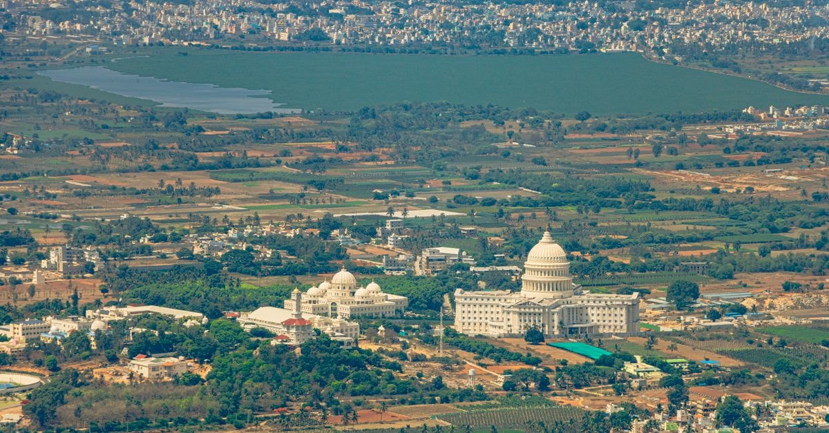 Western Tower in Belagavi: A Stay Tucked Into Khade Bazar Breathtaking aerial view of lush landscapes and architecture near Nandi Hills, Karnataka, India.