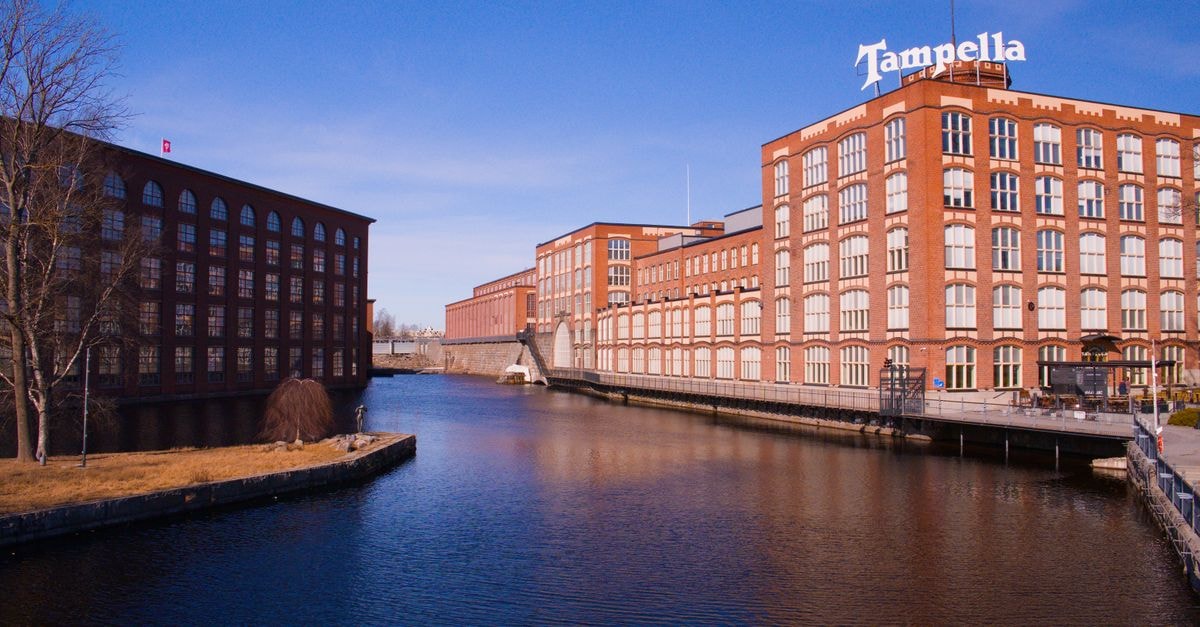 Tampere travel guide: things to do, eat and plan View of the iconic Tampella building along the Tammerkoski in Tampere, Finland.