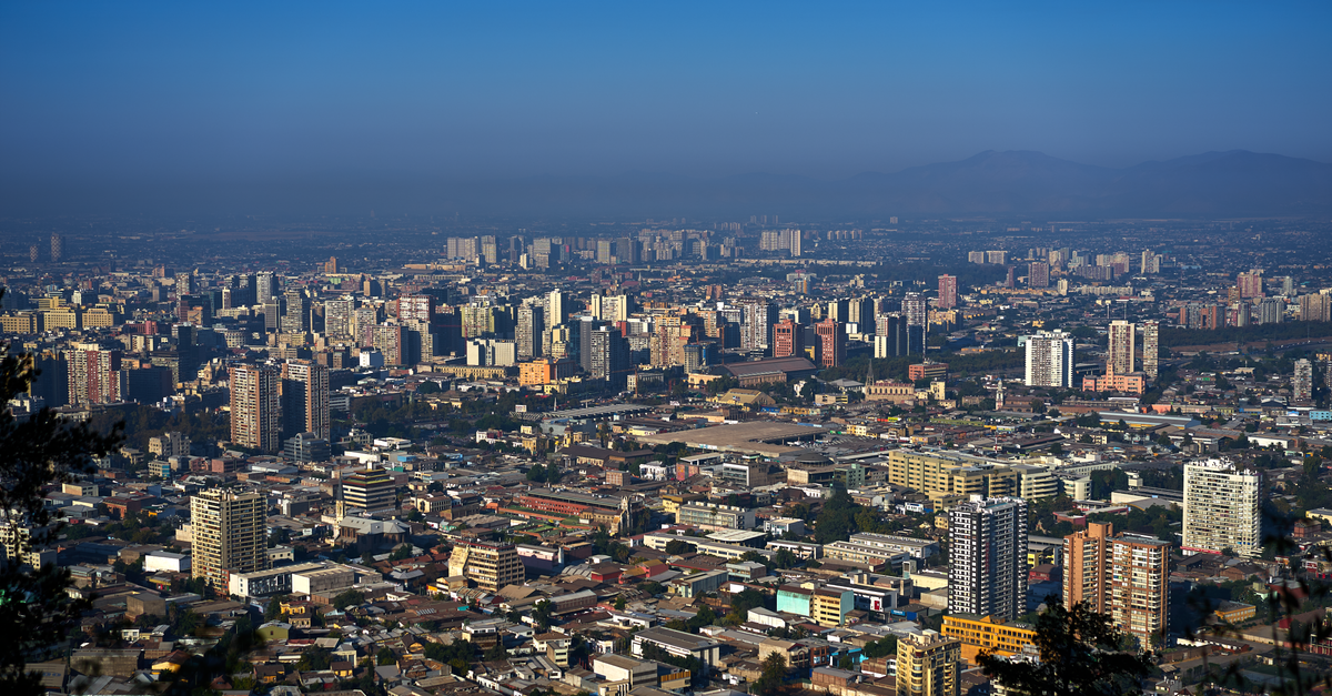 Amerian Hotel in San Miguel de Tucumán: A Barrio Norte Stay Panoramic view of Santiago, Chile, showcasing modern architecture and urban landscape.