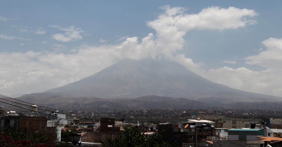 Hotel Katari in Arequipa: Plaza de Armas Views of the White City Majestic view of a volcanic mountain under a cloudy sky, overlooking Arequipa, Peru.