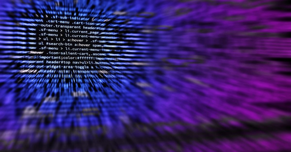 Vietnam presses Qualcomm and Samsung to deepen AI and chip investment Dynamic abstract background featuring computer code in focus with blurred effect.