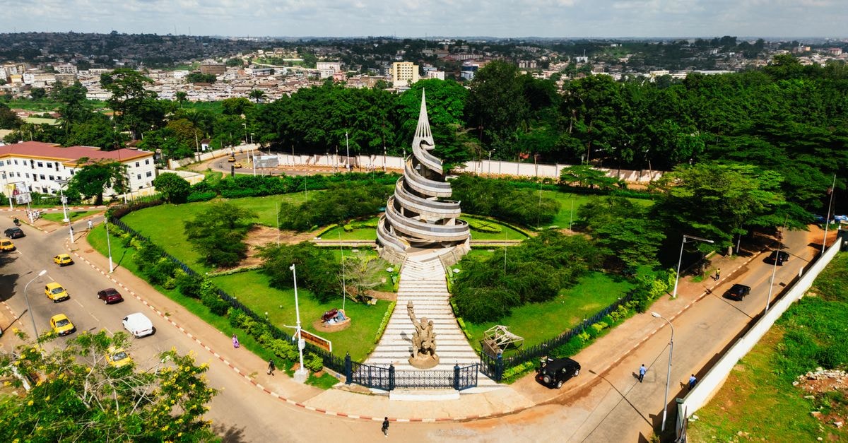 Malabo Travel Guide: Planning Tips, Costs and Things to Do Aerial view of the Monument of Reunification in Yaoundé, Cameroon. Iconic city landmark.