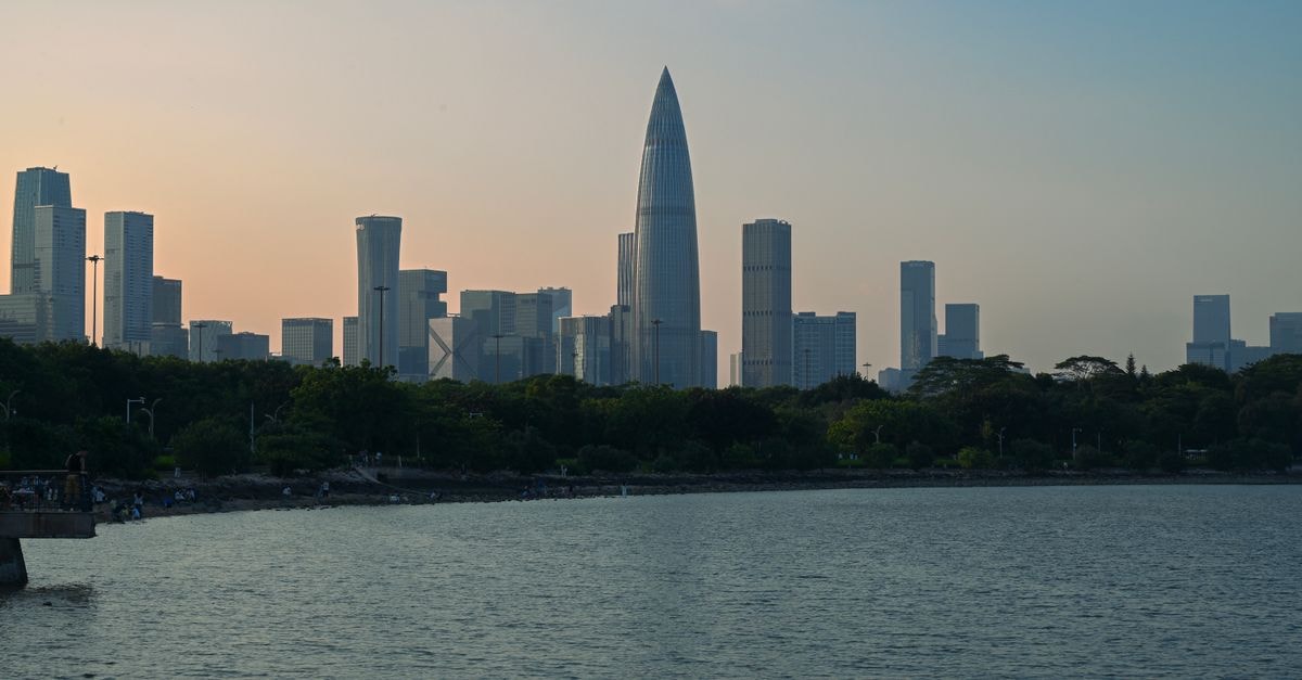 Crowne Plaza Shenzhen Futian: A Central Futian Stay in Shenzhen Scenic view of Shenzhen skyline during sunset with waterfront.
