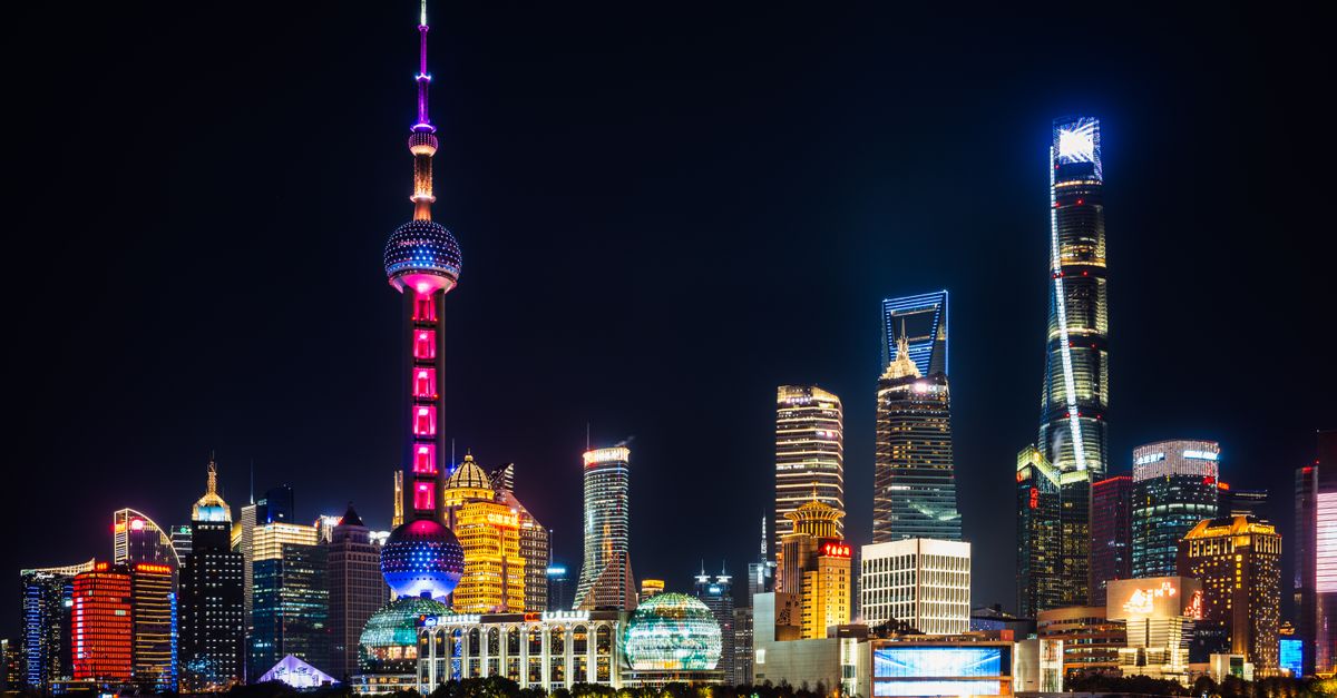 CXMT's blockbuster Shanghai debut crowns China's most valuable listed firm Vibrant night view of Shanghai's illuminated skyline featuring the iconic Oriental Pearl Tower.