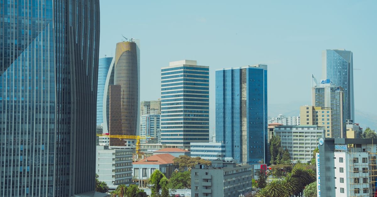 The Retreat, Kigali: An Eco-Luxury Boutique Hideaway Explore the modern cityscape of Addis Ababa featuring towering skyscrapers and vibrant architecture.