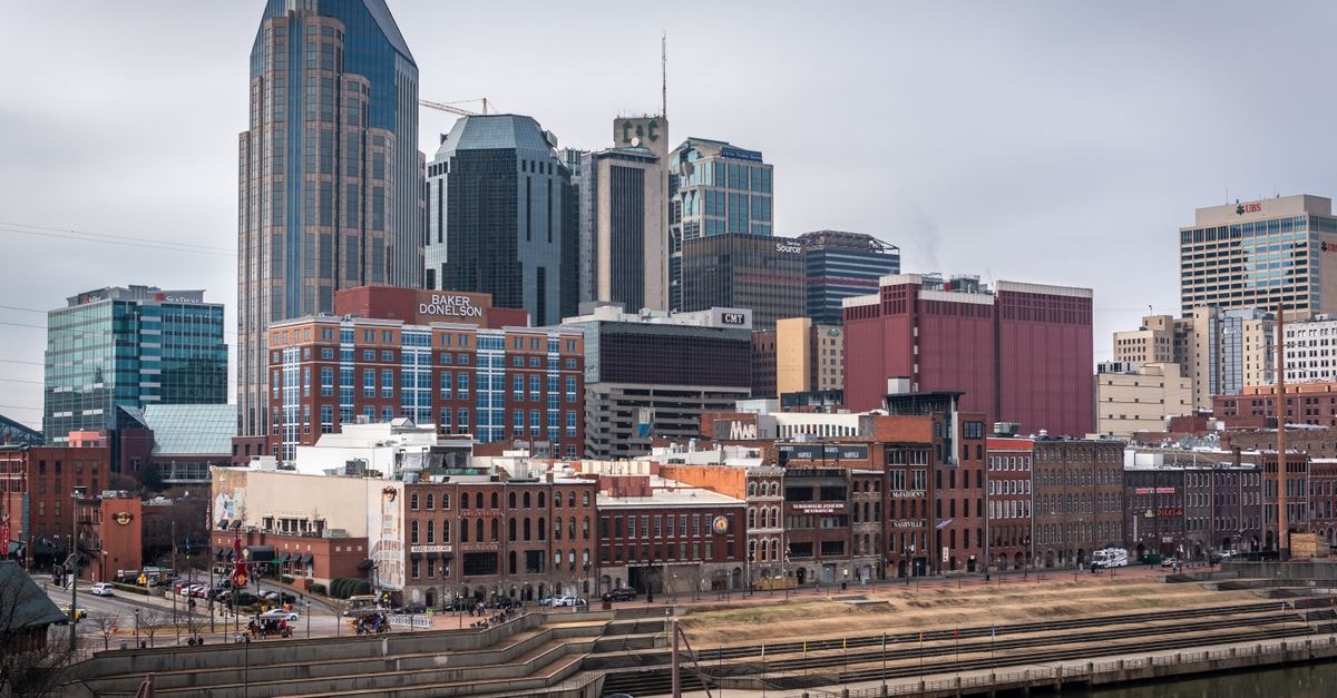 Capture of the Nashville skyline featuring iconic buildings along the Cumberland River.