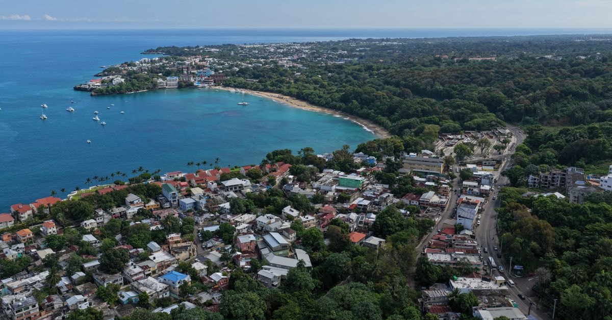 Scenic aerial shot of Sosúa Bay, showcasing vibrant coastal landscape in Dominican Republic.