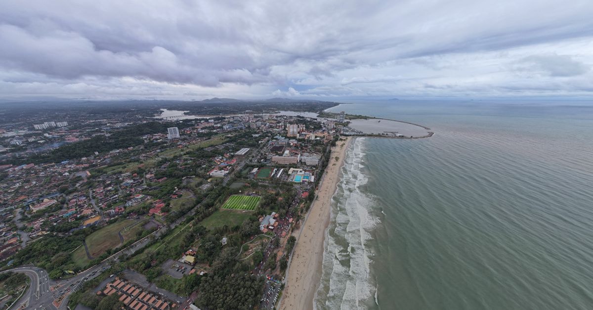 Four Seasons Ruili in Kluang: A Practical City-Centre Stay Near the Bus Terminal Drone aerial image showcasing the beautiful coastline of Kuala Terengganu, Malaysia.